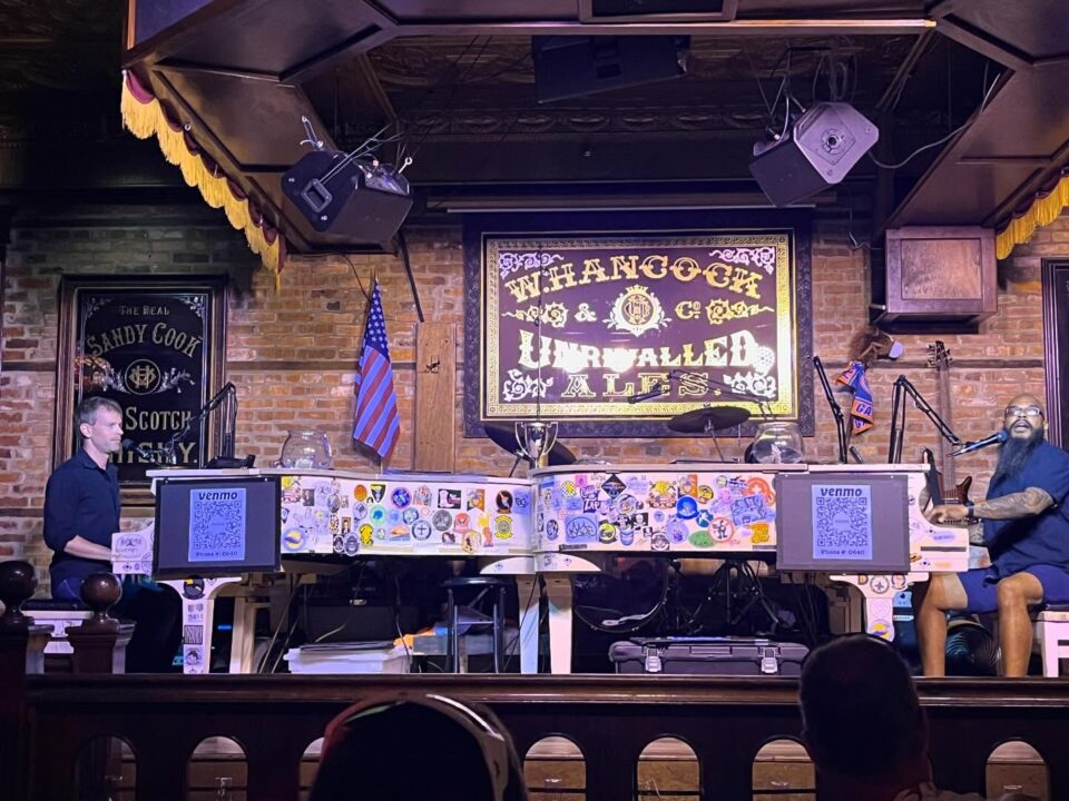 Dueling Pianos playing in Rosie O'Grady's