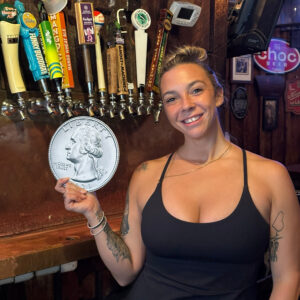 Bartender Holding Quarter Prop in End O' The Alley